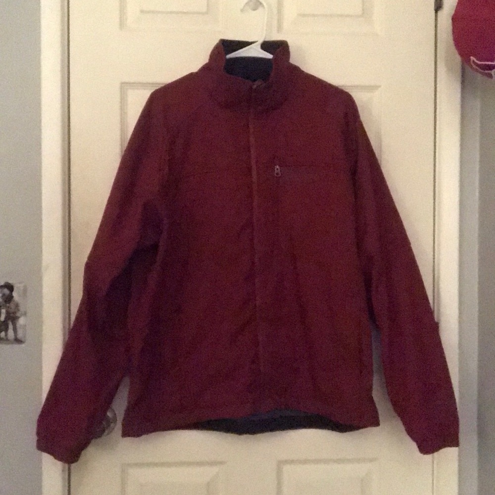 Columbia Sportswear fleece lined dark red jacket.